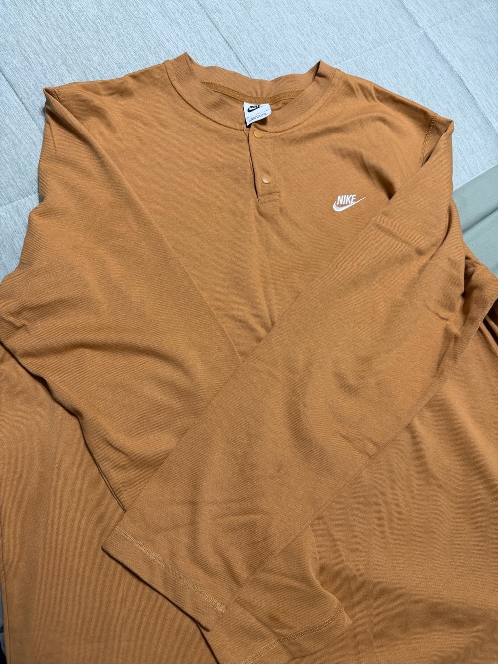 Nike Men’s Long-Sleeve Henley Shirt in Rust Brown